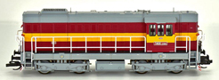 [Lokomotivy] → [Motorov] → [T466.2/T448.0] → 501578: dieselov lokomotiva erven se lutm psem, ed stecha a pojezd