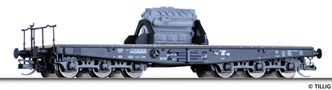 [Nákladní vozy] → [Nízkostěnné] → [6-osé plošinové] → 501802: plošinový černý s nákladem dieselového motoru
